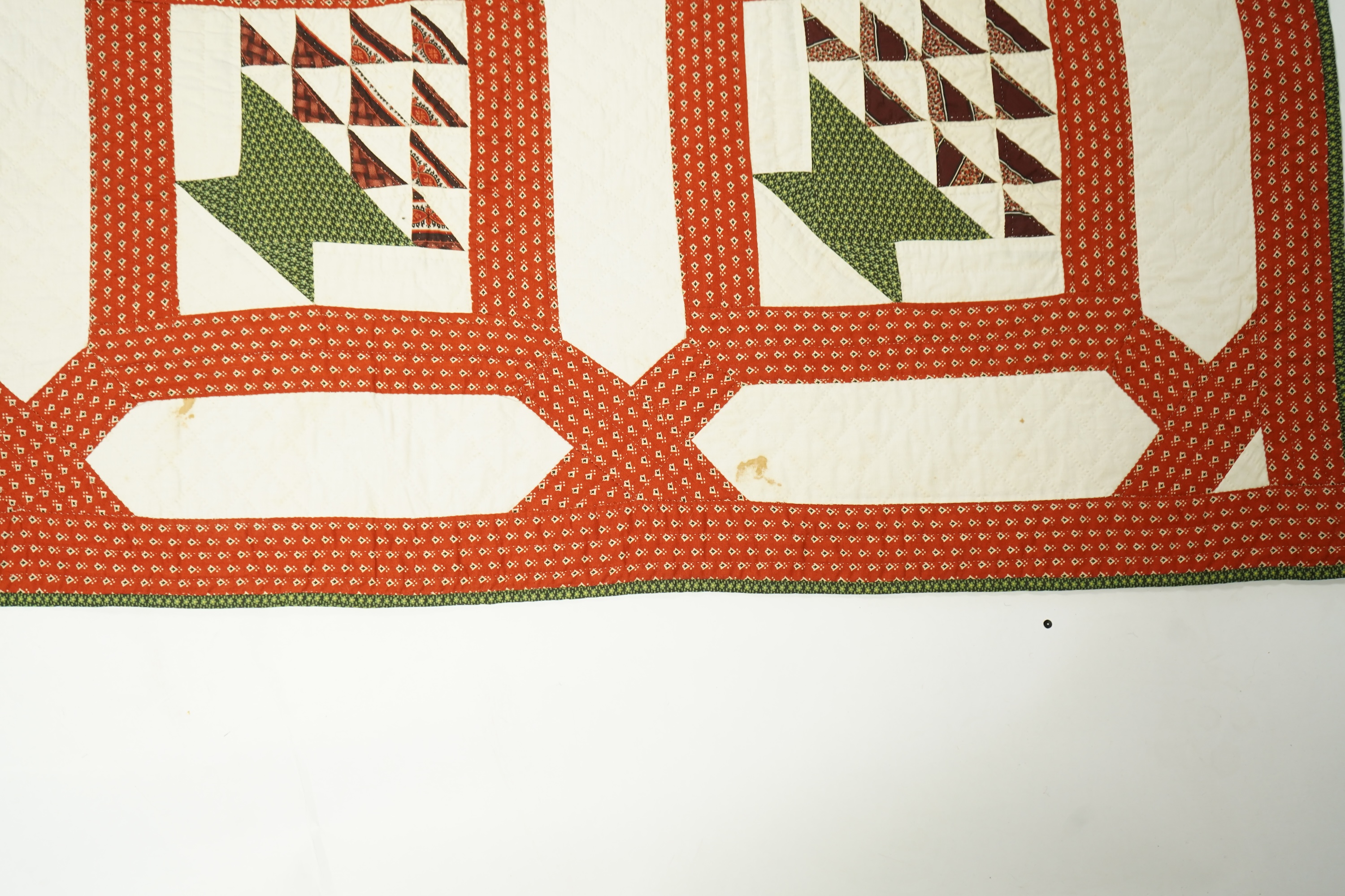 A handsome mid 19th century American ‘Basket’ hand pieced and hand quilted bed cover. An unlaundered Civil War quilt. The reverse side a printed quilted cotton. This quilt purchased in Virginia. 226cm x 168cm. Condition